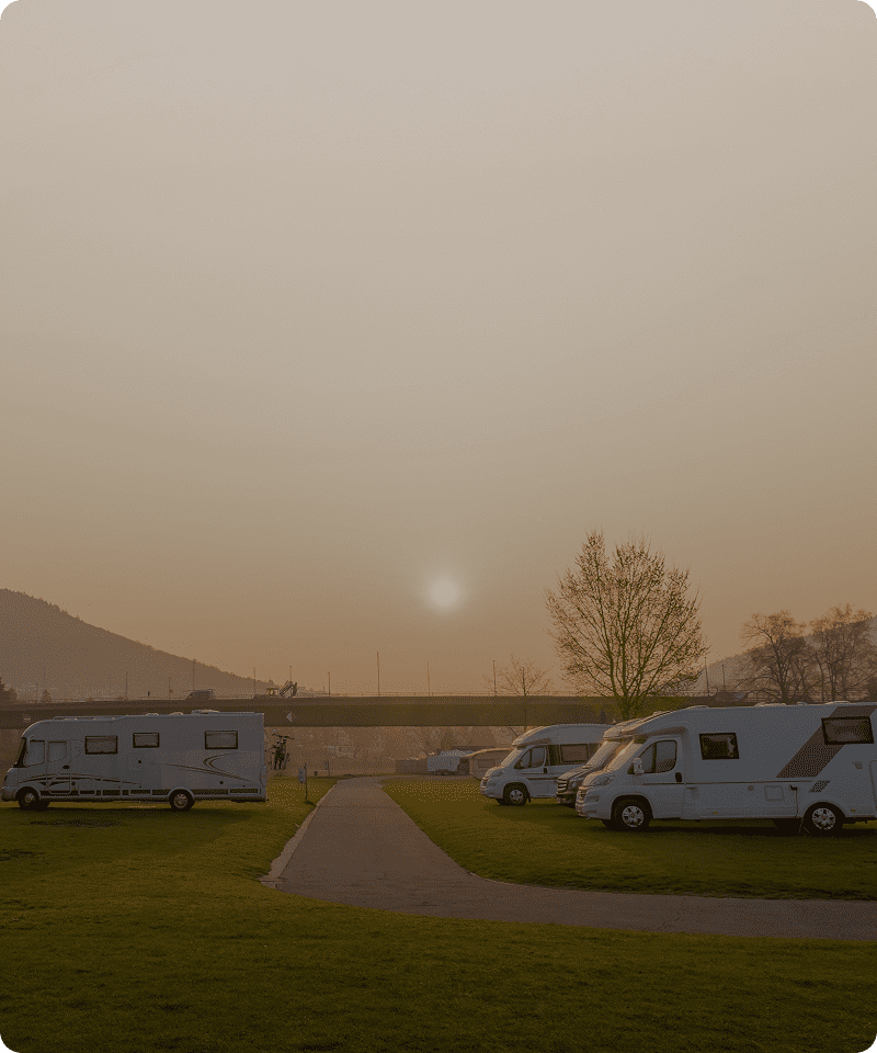 Campground with RVs at dusk